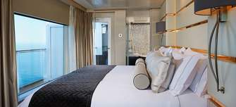 NCL Bliss Haven-Deluxe-Owners-Suite-Bedroom.jpg